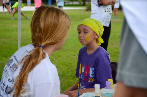 The president of Cross Out Cancer, senior Lizzie Dolan, hopes more cancer patients and their families attend the race, so participants see the people they are helping. 