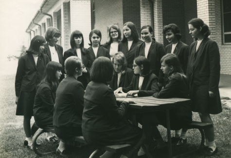 Class of 1969 students gathered near the chapel.