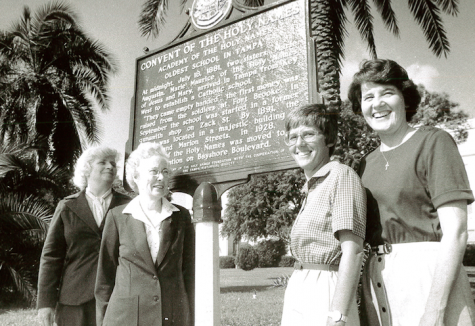 Sister Mary Glavin pictured ont eh right with other Holy Names Sisters near the entrance of campus.
