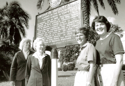 Sister Mary Glavin pictured ont eh right with other Holy Names Sisters near the entrance of campus. 