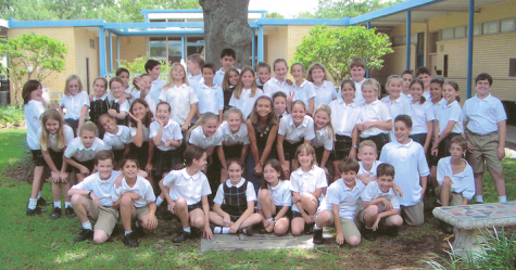 4th Grade students surrounded by their classrooms, which is now the dance room. 