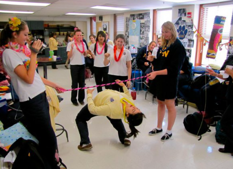 "During one of our last days of school, my class threw a hawiian-themed party in our senior lounge and I showed off my limbo skills!" says Martinez. Credit: Olivia Martinez