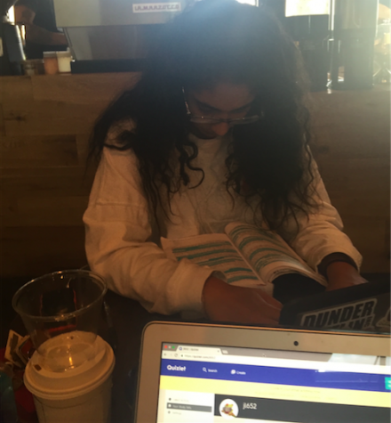 Neha Simon and Julia Lee work on A-Push homework at their designated study spot, DI Coffee Bar.